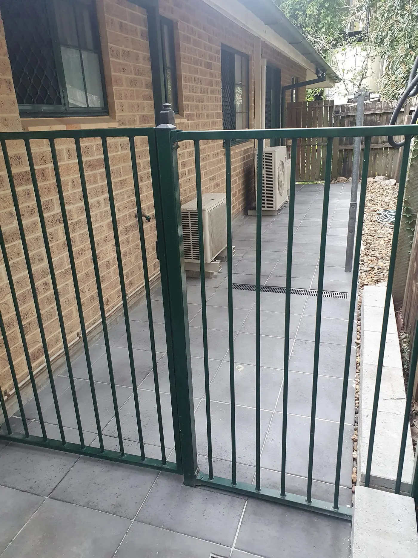 Paving corner with garden bed