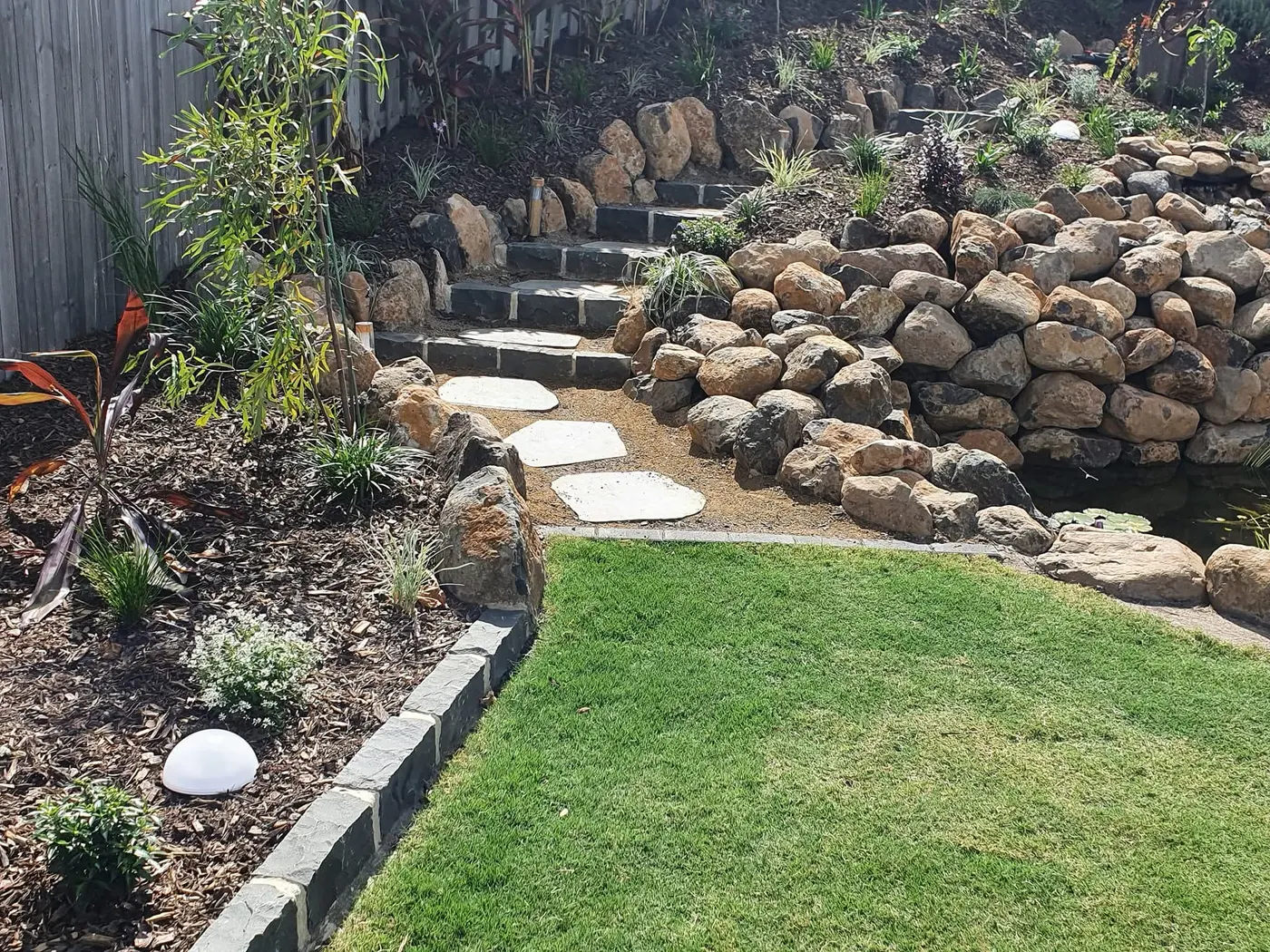 Stone stairs and pond edge detail